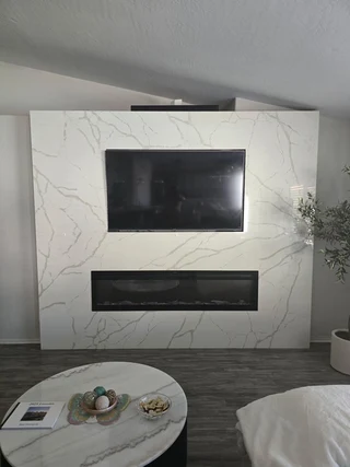Quartzite fireplace surround in a Mesa residence