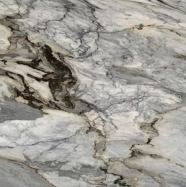 Marble with flowing gray and charcoal veining