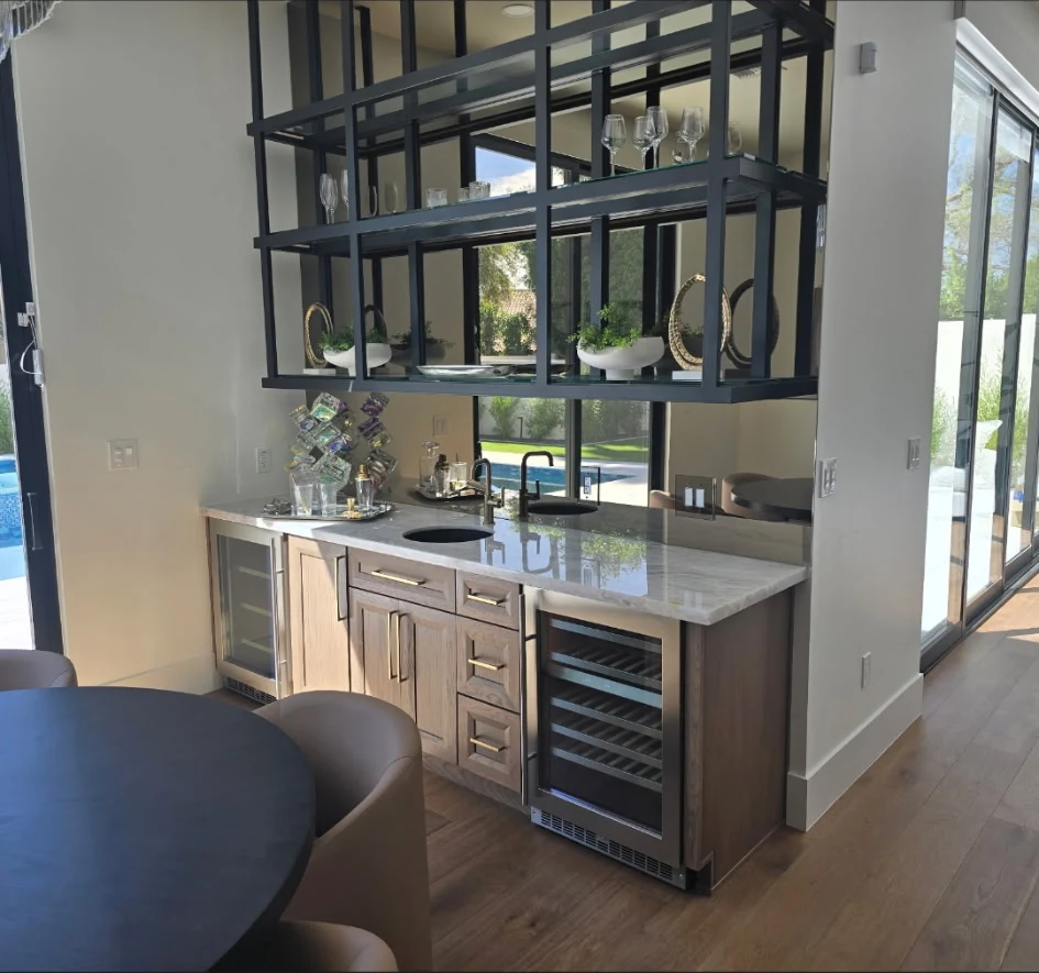 North Scottsdale wet bar with a stone countertop, sink and wine refrigerator (an indoor project shown for fabrication detail)